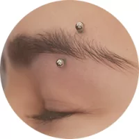 Rings to eyebrow